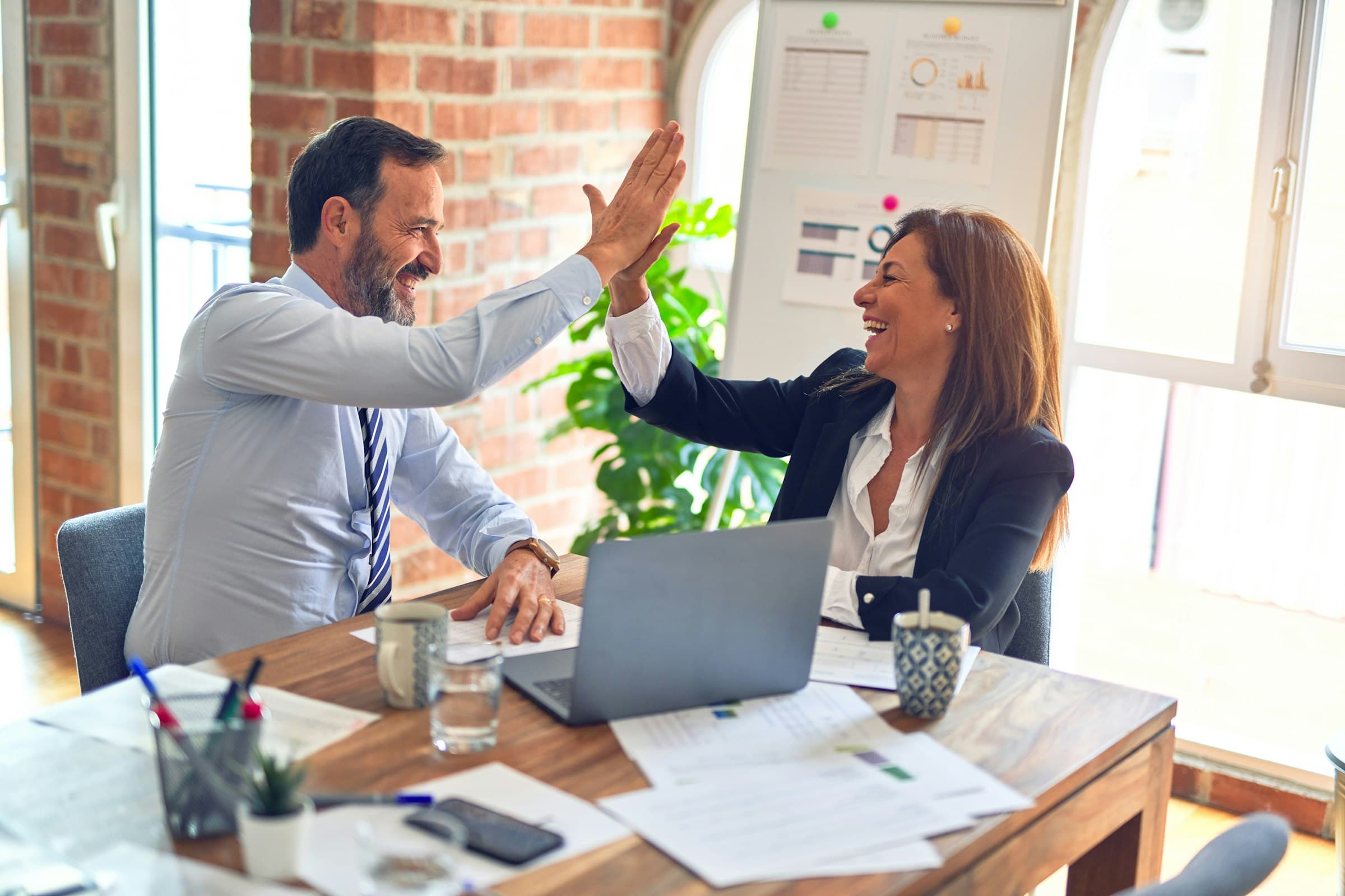 Sales team collaborating in a modern workspace